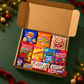 Christmas Eve Treat Box for Kids with 12 sealed snacks in an open kraft box on a festive green background