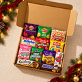 Christmas Hug from Afar Snack Gift Box with 12 sealed packs on a warm cream festive tabletop