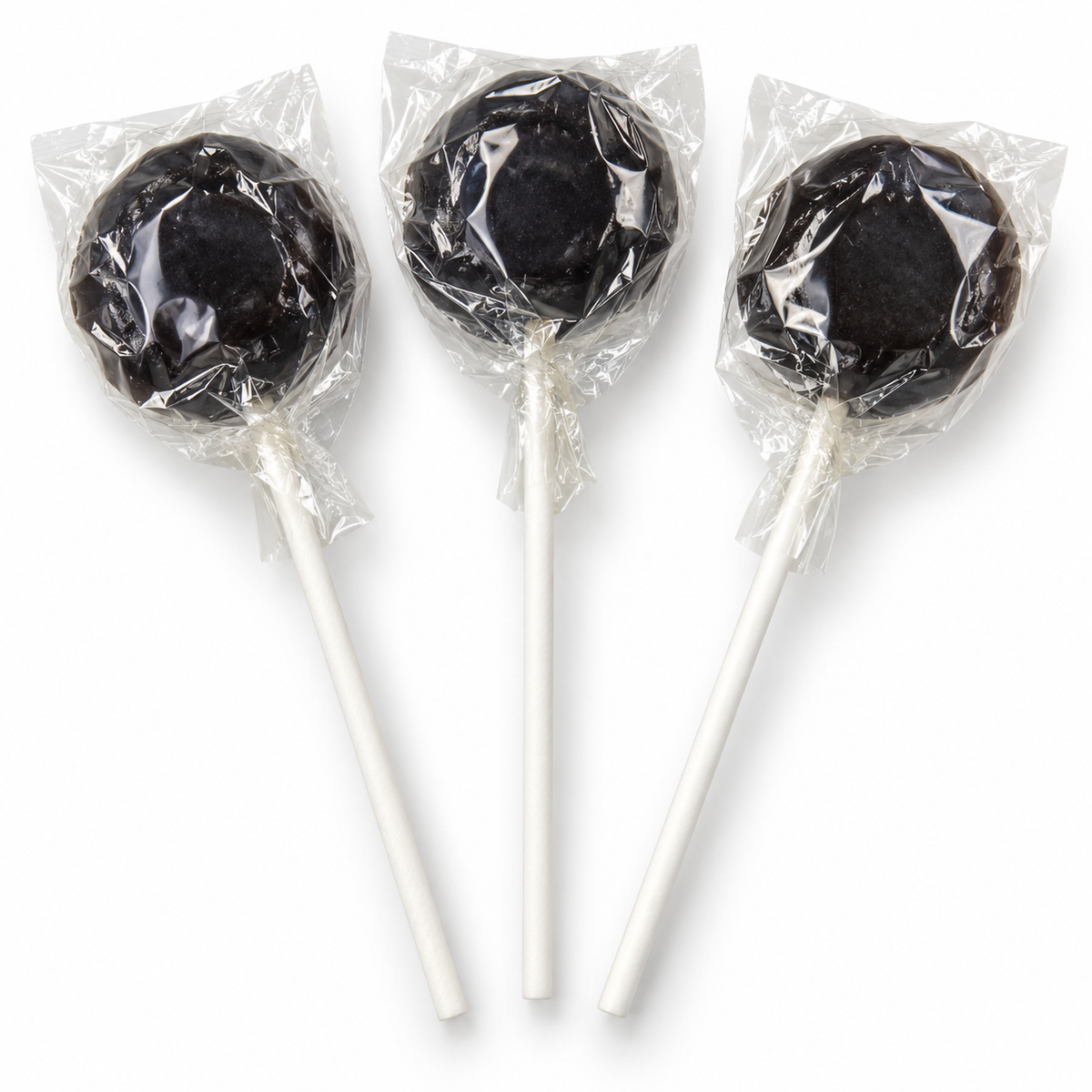 Three individually wrapped Dobsons Bonfire treacle lollies
